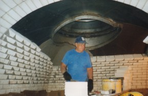 Jimmy Bleich installing insulating firebrick in a citrus dryer
